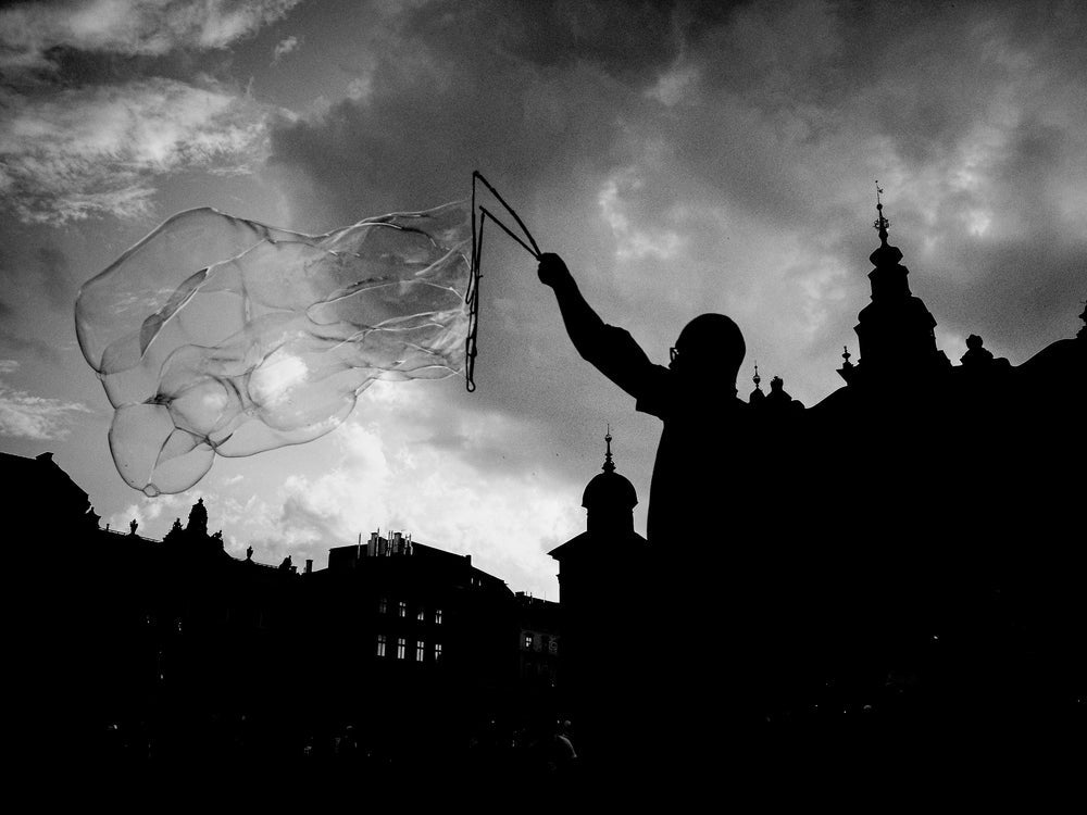 person-uses-string-to-create-a-huge-bubble